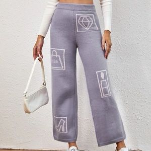 Pantalones de punto con patrón de bolso y letra